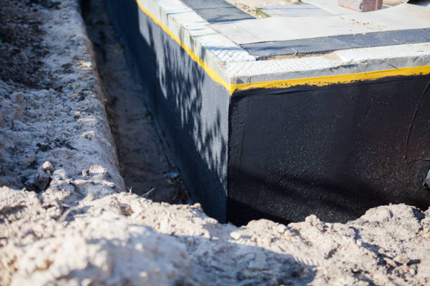 Professional Waterproofing technician working in Leipsic, OH